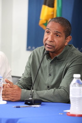 Delroy Williams (JLP) taking questions from the press